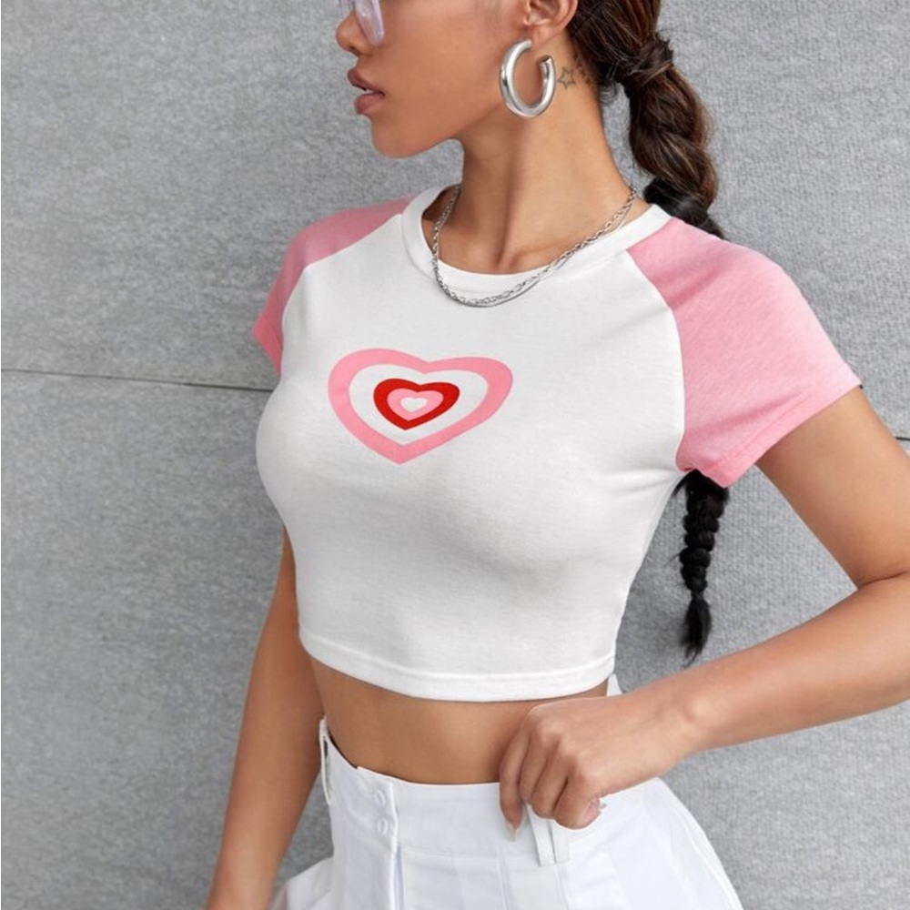 Large white and pink cropped baby tee with powerpuff girls heart logo